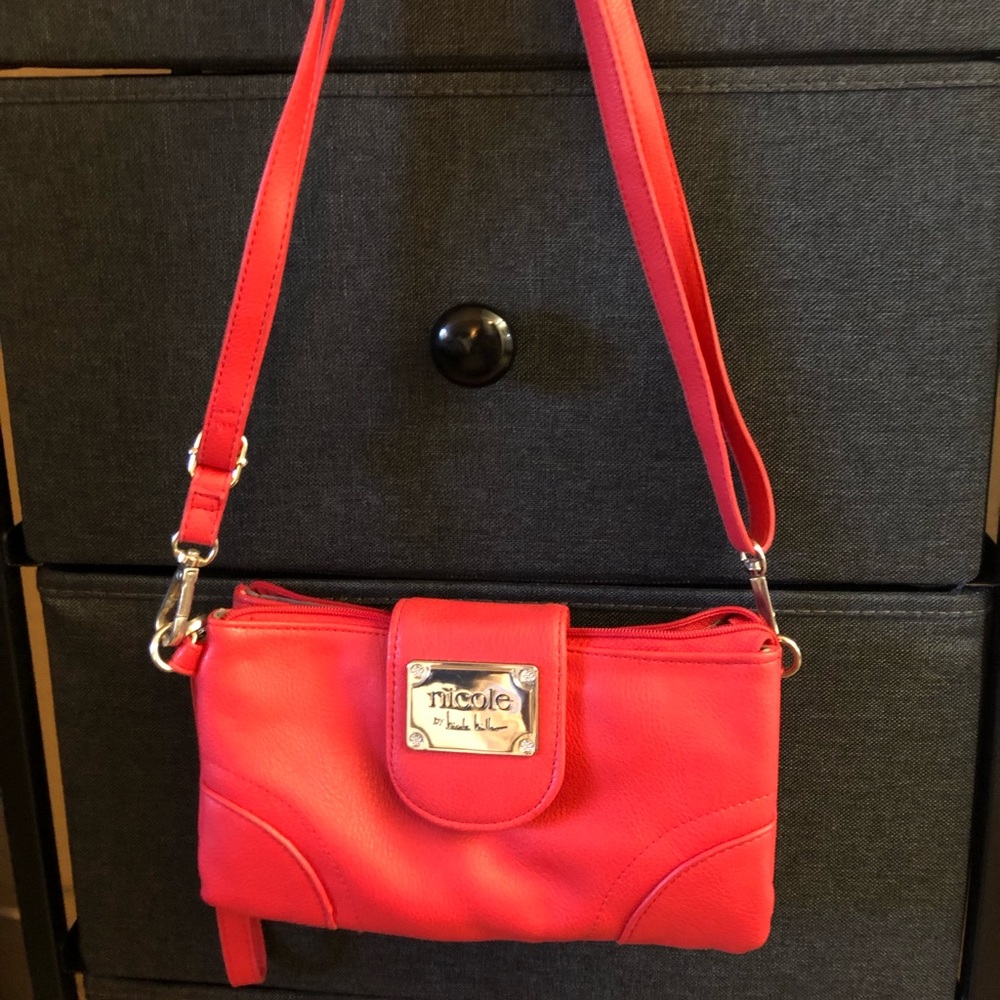 Adorable red Nicole Miller purse. Great casual day or evening bag!